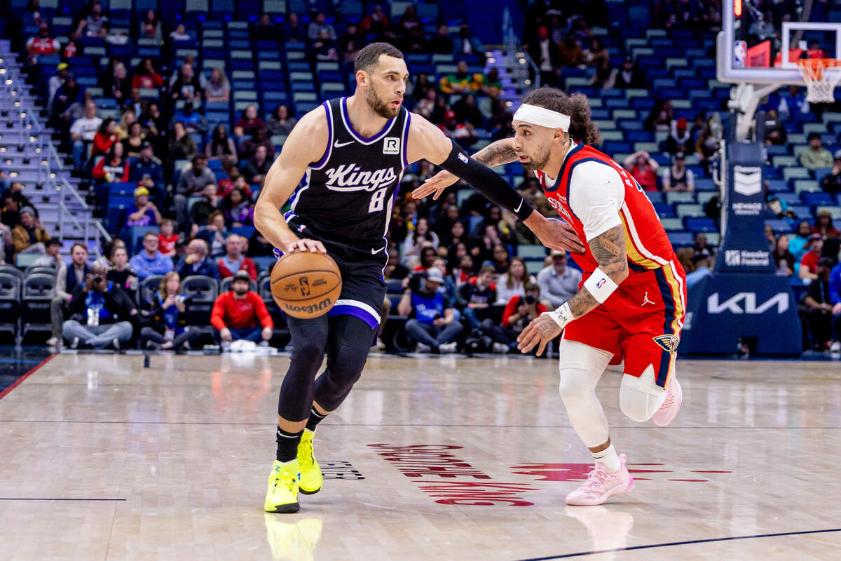 Sacramento Kings guard Zach LaVine (8) dribbles against New Orleans Pelicans guard Jose Alvarado (15) during the first half Thursday, Feb. 13, 2025, at Smoothie King Center in New Orleans, Louisiana.