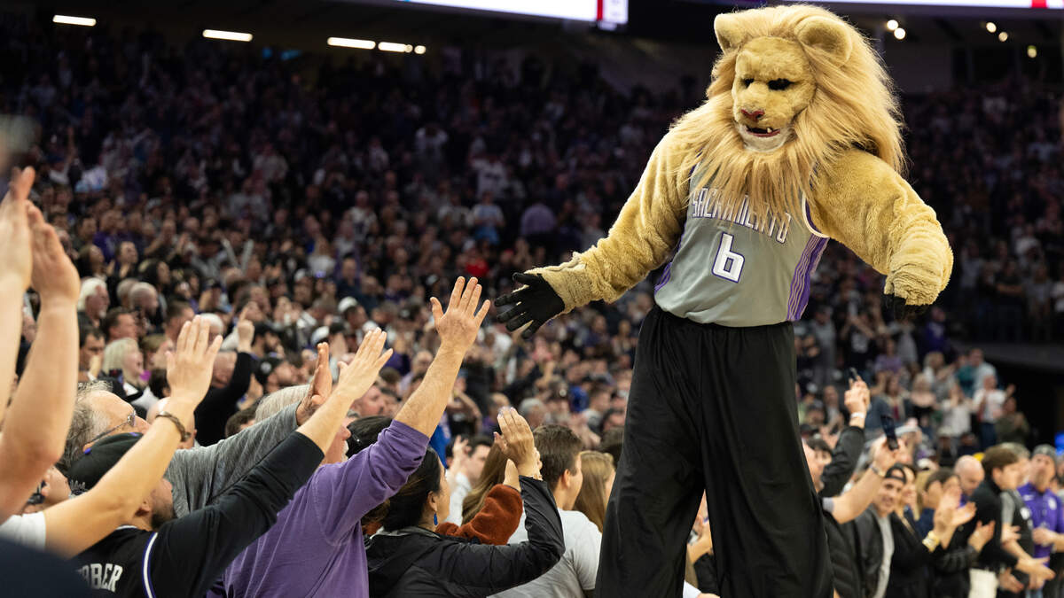 Sacramento Kings mascot Slamson high-fives fans in the fourth quarter during a game at Golden 1 Center on Monday.