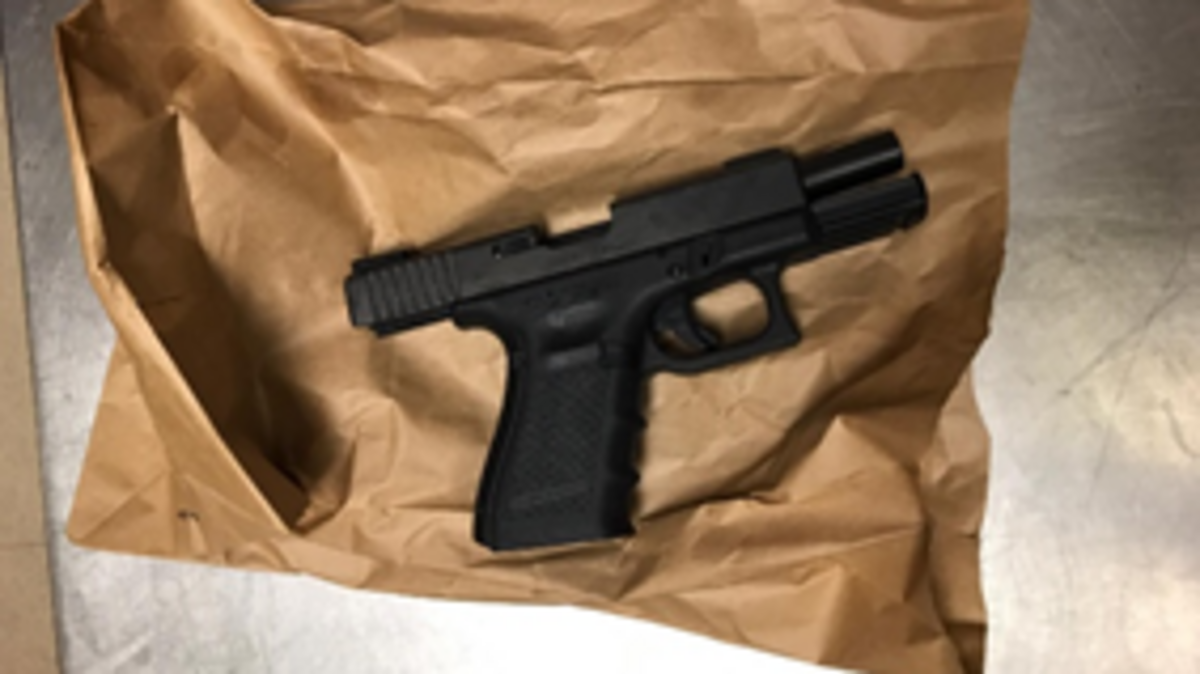 Woodland police arrested two people in connection with a robbery investigation on Thursday.