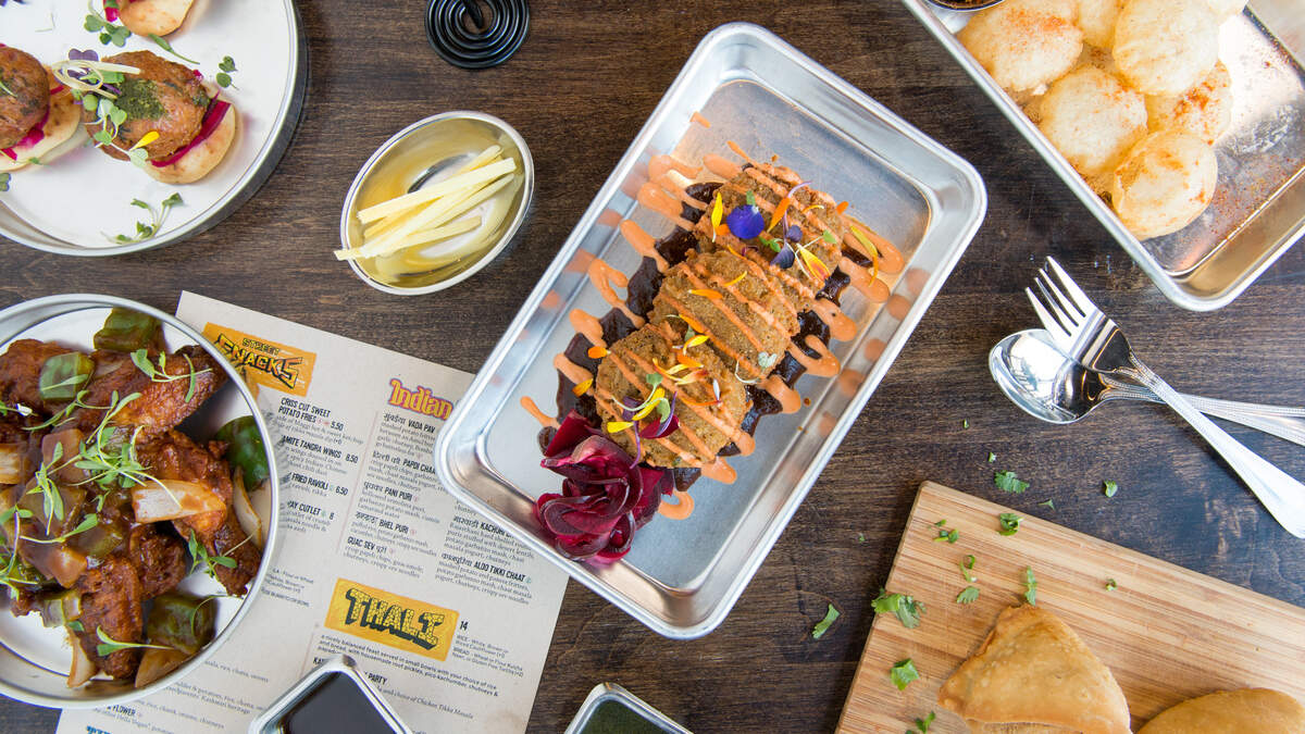 A sampling of dishes offered at Curry Up Now, a Bay Area-based chain known for its innovative approach to traditional Indian cuisine.  The business has finalized a franchise deal to open a Sacramento location.