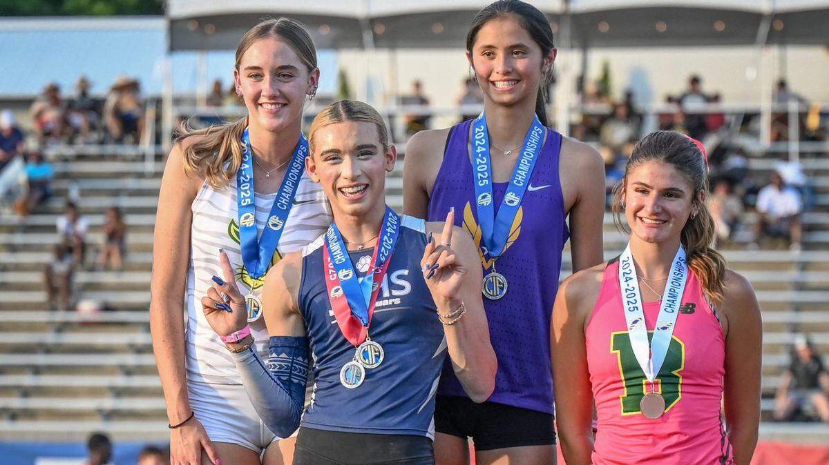 Three first-place medals were awarded in the high jump at the track-and-field championships held in Clovis last month, including one that went to a transgender athlete AB Hernandez, second from left. CIF modified its rules to allow multiple medals to be awarded when a transgender athlete finishes in a top place.