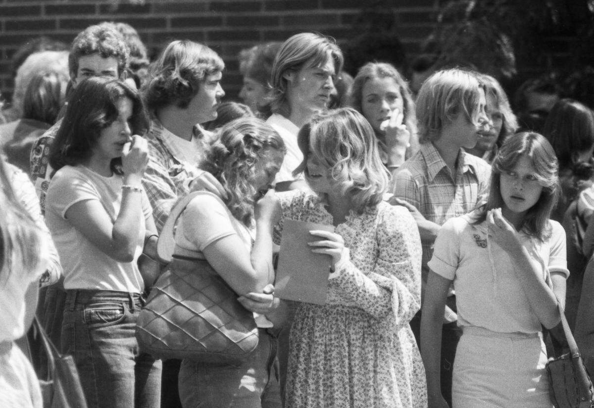 Students and families grieve outside the Yuba City Ward of the Church of Jesus Christ of Latter-day Saints on May 24, 1976, for some of the 29 victims of the Yuba City High School bus crash in Martinez days before. 