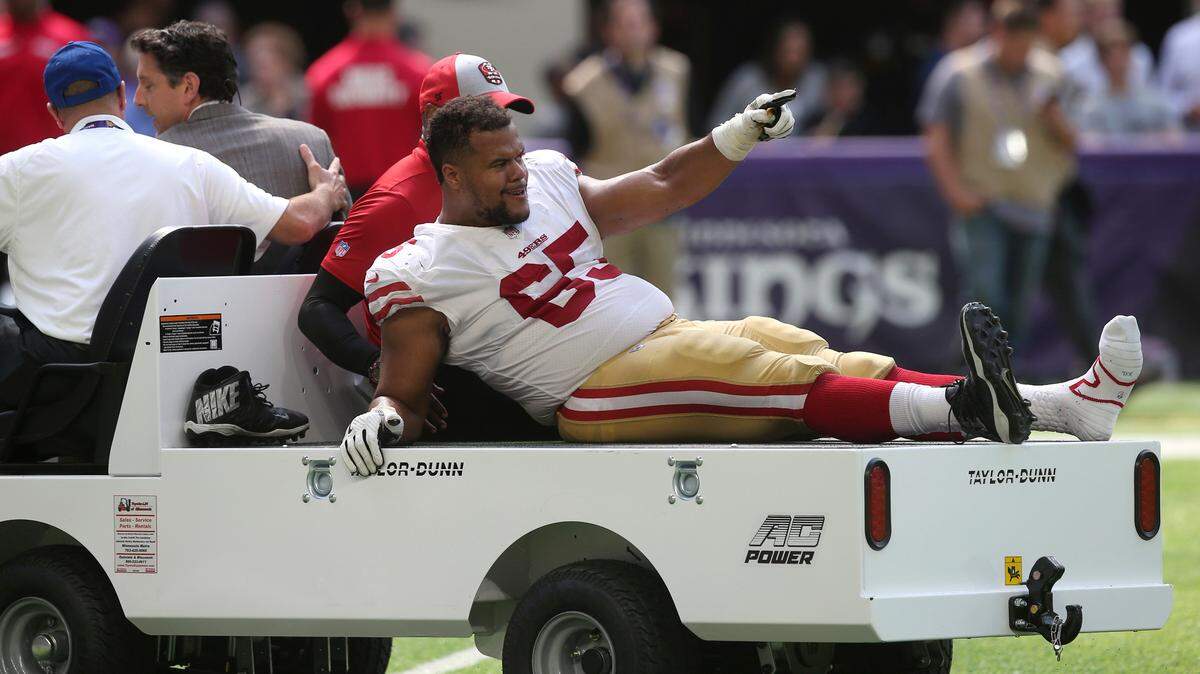 San Francisco 49ers offensive guard Joshua Garnett is carted off the field after getting injured against the Minnesota Vikings, Sunday, Sept. 9, 2018, in Minneapolis.