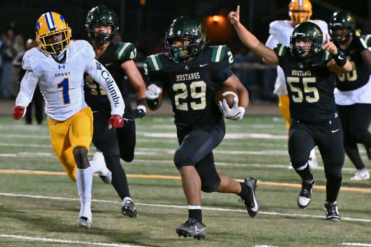 The Monterey Trail Mustangs’ Vontrelle Waffer (29) runs the ball for 28-yards to the 2-yard line in the first half of the game against the Grant Pacers on Friday, Oct. 20, 2023, at Monterey Trail High School in Elk Grove.