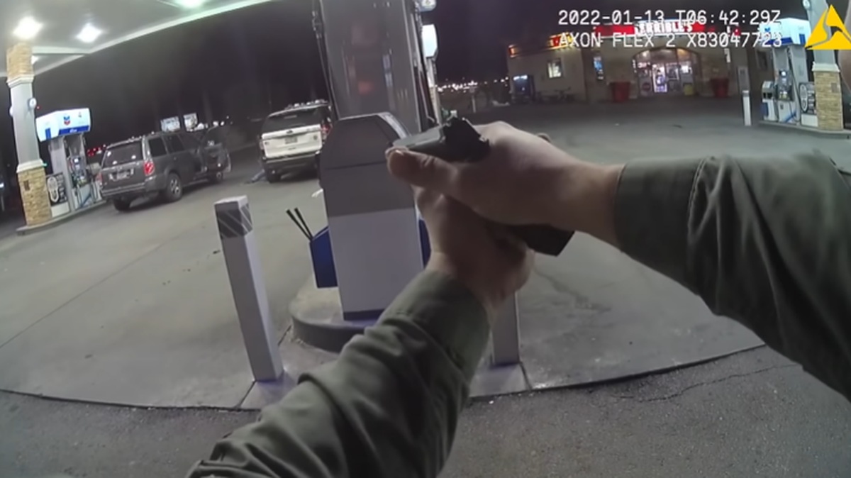 A body camera video from police captured a shooting of a 34-year-old man in Las Vegas on Jan. 12, 2022. The man is accused of pointing a gun at two officers at a Chevron gas station, police said, but he never fired his weapon.