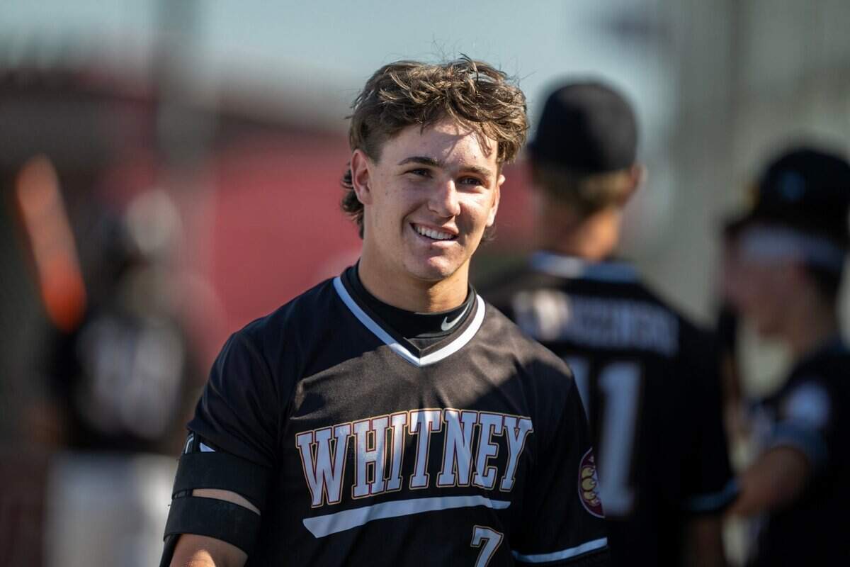 Whitney’s Jax Gimenez smiles during the top-seeded Wildcats win over Cordova in a first-round CIF Sac-Joaquin Section Division ll baseball playoff game on Tuesday.