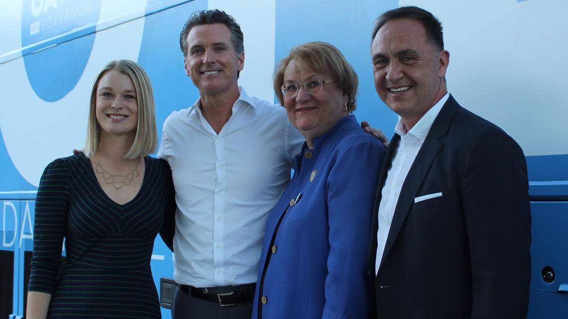 From left, Palm Springs City Councilmember Christy Holstege, Gov. Gavin Newsom, Palm Springs Councilwoman Lisa Middleton and Equality California Executive Director Rick Zbur are pictured in November 2018.