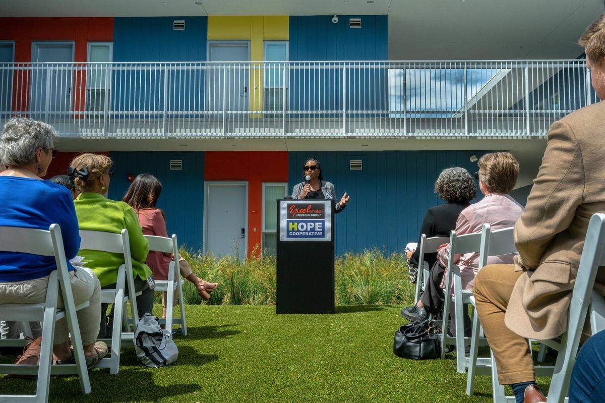 Hope Cooperative CEO April Ludwig speaks at the grand opening of Northview Pointe, a 67-unit permanent supportive housing development for people experiencing homelessness in North Sacramento, on Wednesday.