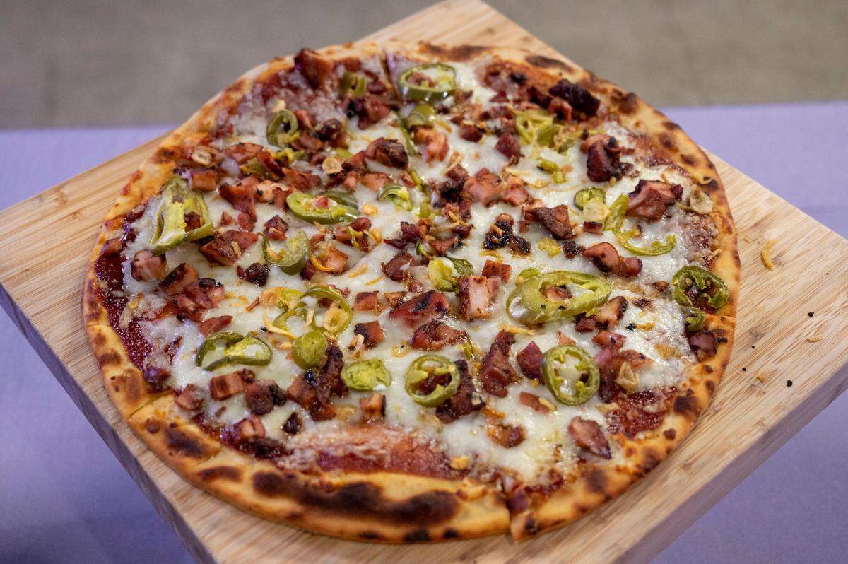 Paragary’s BBQ Chicken Pizza, made with BBQ Mary’s chicken, house BBQ sauce, mozzarella, pickled jalapenos and fried shallots is one of the new Local Eats menu items available at Golden 1 Center for the 2022-23 Sacramento Kings Season.