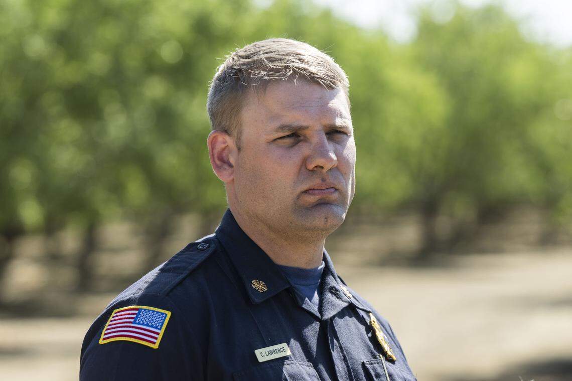 Curtis Lawrence, Esparto Fire Chief, listens to questions during an Esparto pyrotechnics compound fire press conference on July 7.