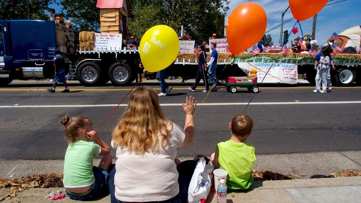 Parade-watchers watch the Western Festival Parade on Elk Grove Blvd in 2005. Organizers were eager for the Elk Grove Western Festival to return in 2022 after the ongoing pandemic led to the canceling of the 2021 event, but made the call to cancel the event due to COVID and sponsor concerns.