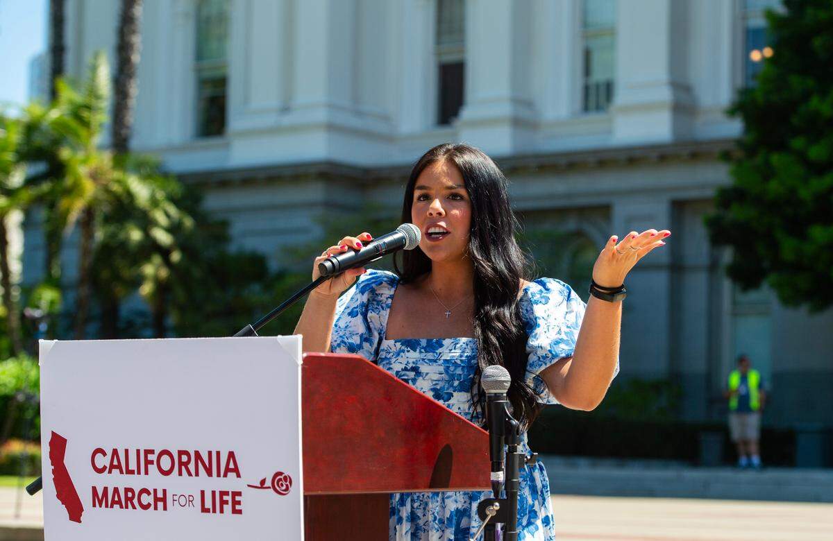 Sophia Lorey, outreach director at the California Family Council and an outspoken Christian conservative who speaks out on the issues of trans girls playing on girls’ sports teams, speaks at the California March for Life rally Monday.