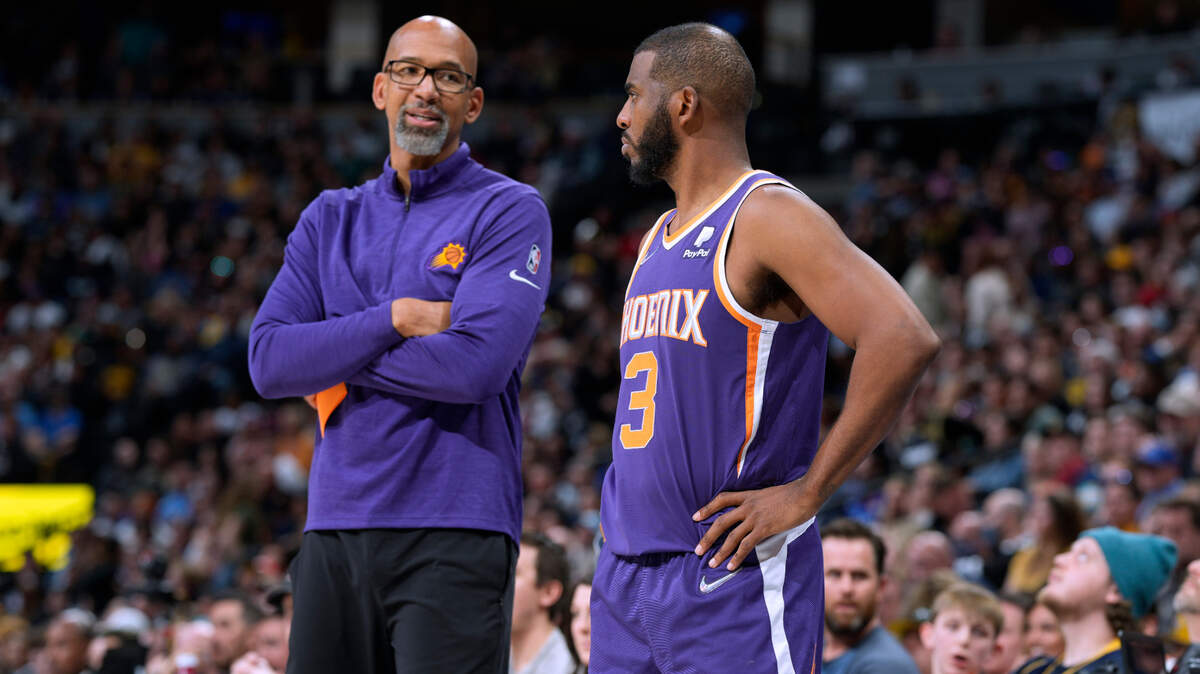 Phoenix Suns coach Monty Williams, left, chats with guard Chris Paul late in the second half of the team’s NBA basketball game against the Denver Nuggets on Thursday, March 24, 2022, in Denver. (AP Photo/David Zalubowski)