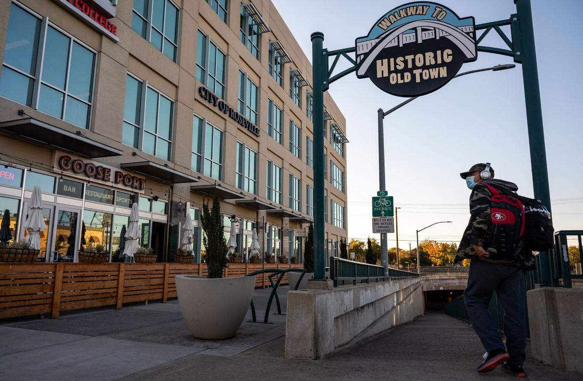 Robert Nichols, who was born in Roseville and grew up in Lincoln, turns on the Washington Avenue walkway under the railroad tracks on his way to the Greyhound station on Wednesday, Oct. 13, 2021. He attributes the city’s population growth to the construction of new buildings.