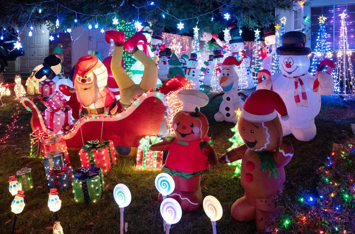 A 2022 Christmas light display at 8213 Rockbury Way in Antelope features more than 100 snowmen, over 30 Christmas trees, a North Pole scene, a Gingerbread couple and more than 10,000 lights.