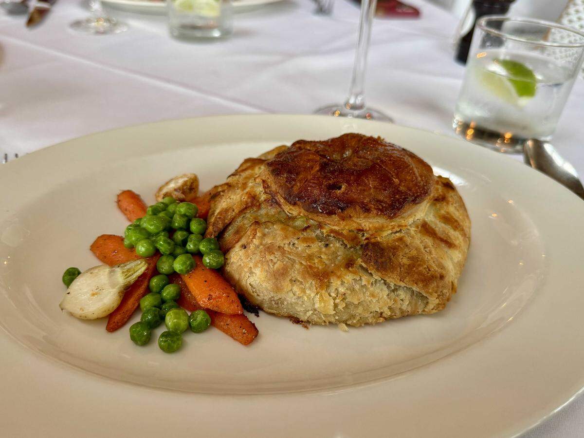 The Waterboy in midtown serves a galette-style chicken pot pie with roasted carrots, turnips and peas.