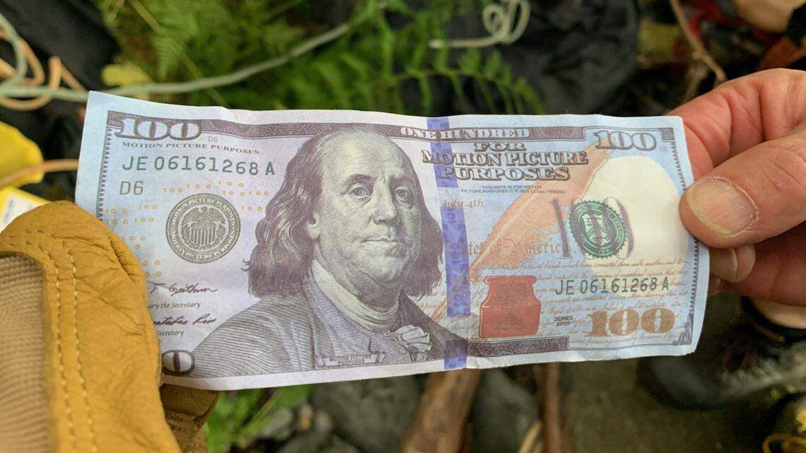 Movie prop money found scattered at Multnomah Falls posed a risk to hikers seeking the phony cash, Oregon officials say.