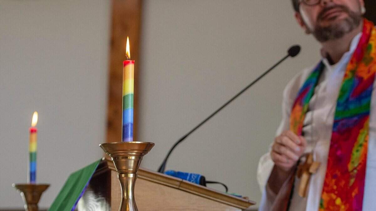 Pastor Casey Tinnin watches a video during the service Sunday, June 26, 2022, at Loomis Basin Congregational Church.