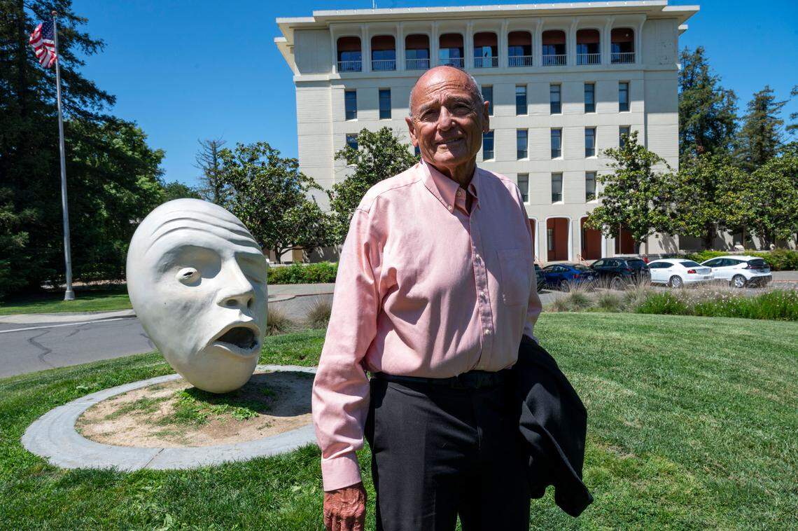 Bob Dunning stands near the Davis School of Law on Tuesday. Dunning has written about Davis for 54 years and despite his layoff from the Davis Enterprise, he says not done yet.