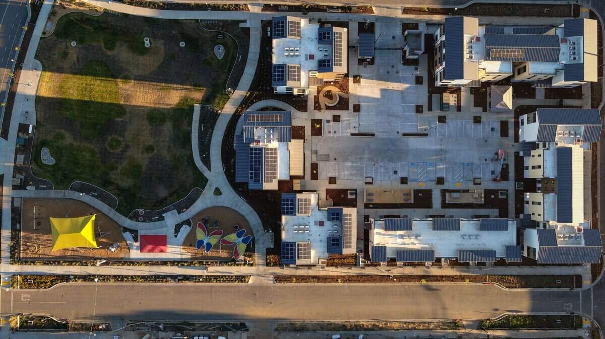 A portion of the Mirasol Village affordable housing community is seen by drone under various phases of construction on June 29, 2022, in Sacramento near Richards Boulevard in the River District.
