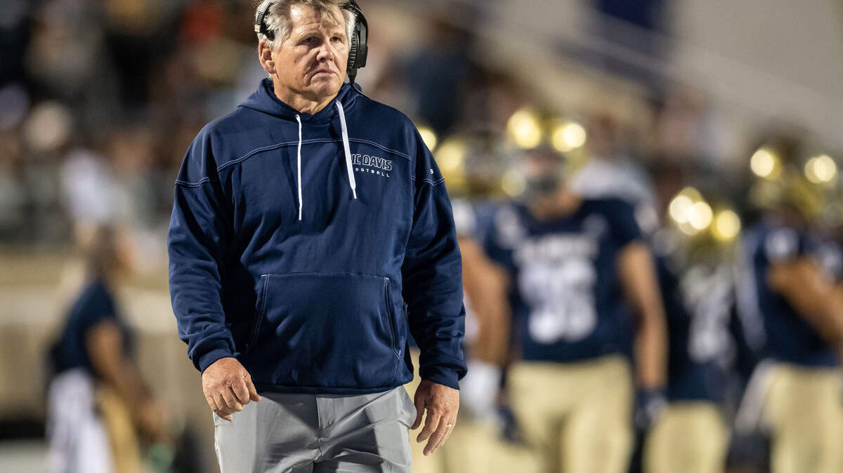 UC Davis Aggies head coach Dan Hawkins watches his team’s lead over the University of San Diego during the first half of the NCAA college football game Saturday, Sept. 17, 2022, at the Aggies’ home opener at UC Davis Health Stadium.