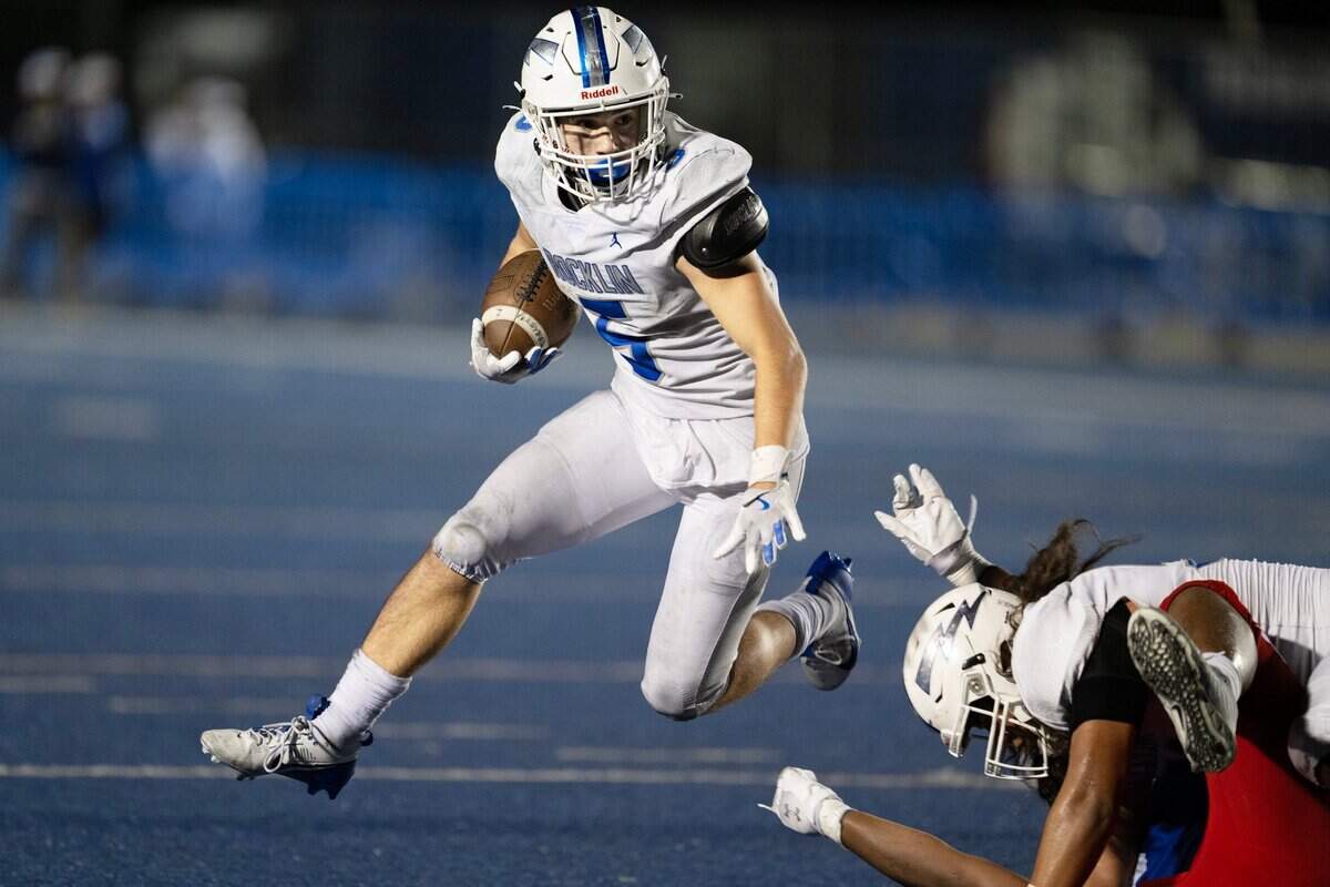 Rocklin Thunder running back Derek Keeley (5) jumps past a defender Friday against the Folsom Bulldogs. The No. 3 Thunder will play No. 6 Jesuit this week.