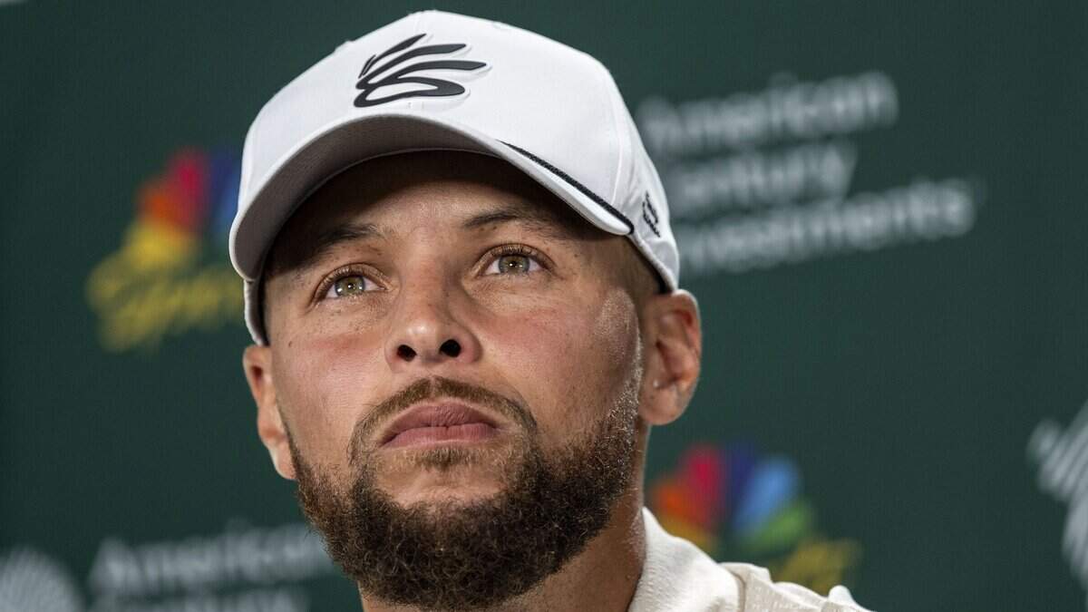 Stephen Curry of the Golden State Warriors answers questions about the possibility of landing LeBron James during the American Century Championship at Edgewood Tahoe Golf Course in Stateline, Nevada, on Thursday.