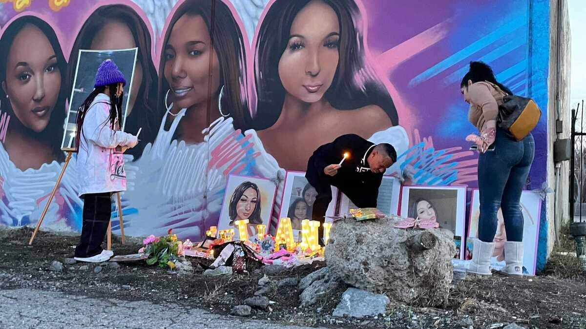 Family members of victims of homicide and violence light candles at a mural painted to remember them Sunday on Florin Road. Family members of Michelle Benavidez, who was killed at a Sacramento light rail station in 2021, have started a multiplatform initiative that uses art and storytelling to educate the public and honor victims of homicide and violent crimes.