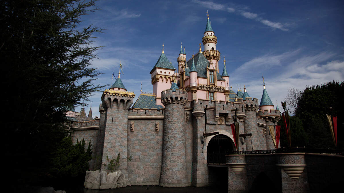 Walt Disney Co. will cut pay this week to 100,000 employees on furlough, nearly half its workforce, to cut costs as coronavirus lockdowns keep theme parks shuttered.