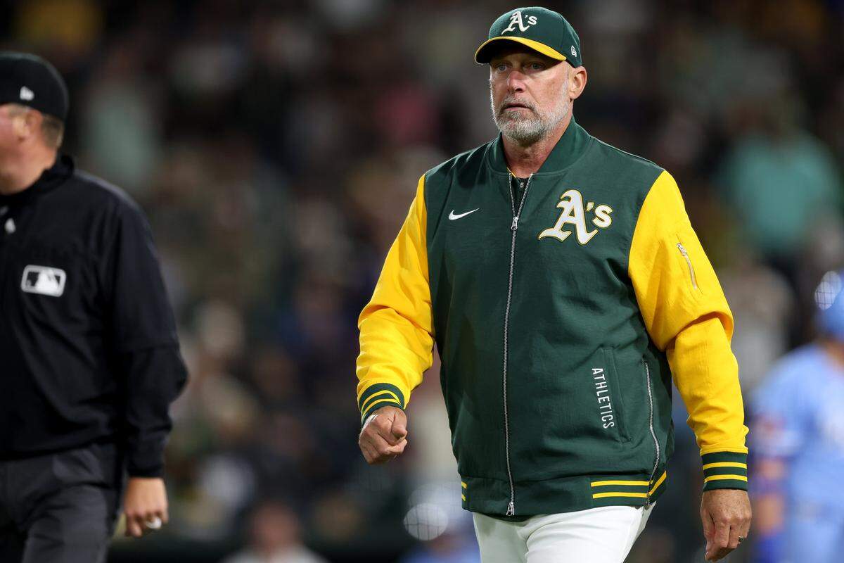 Athletics manager Mark Kotsay (7) walks back towards the clubhouse after getting ejected from the game against the Kansas City Royals during the ninth inning Saturday at Sutter Health Park in West Sacramento.