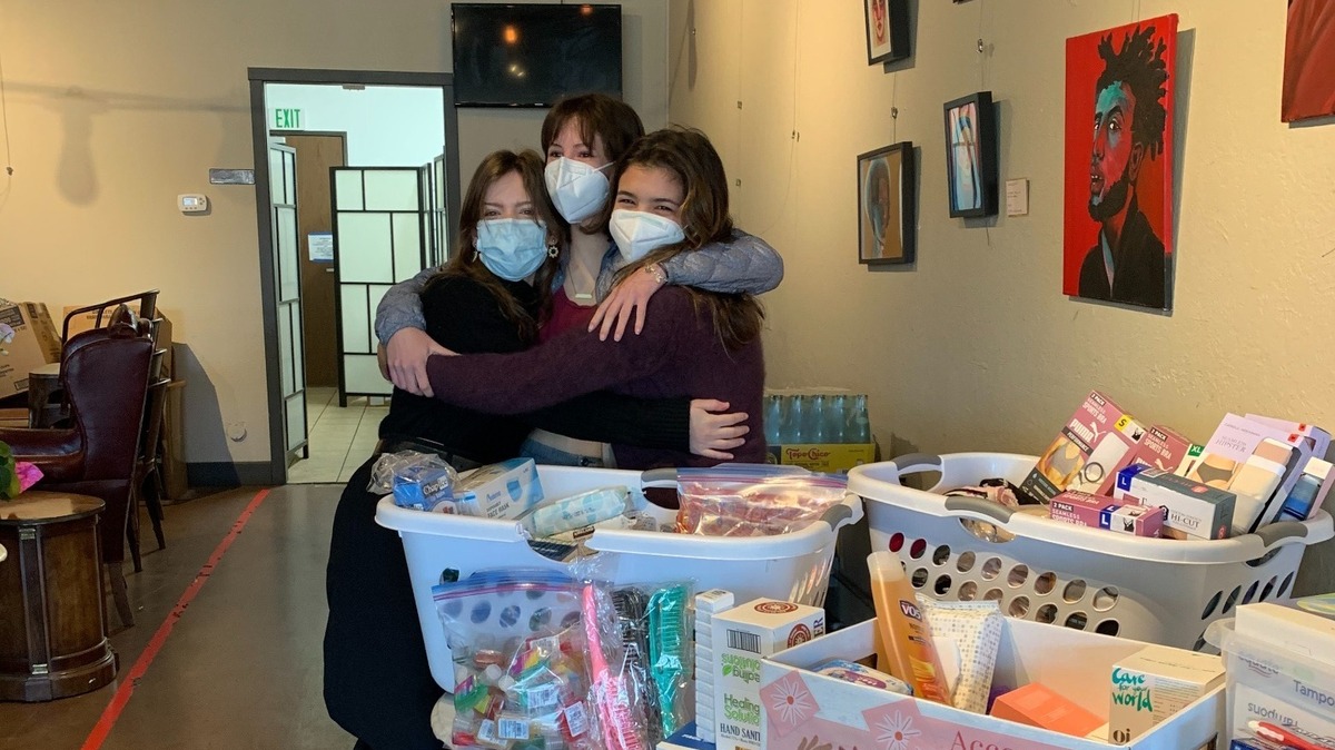 Viva Corless, left, Jenna Yates, Ella Fodor are collecting hygiene products to address period poverty.