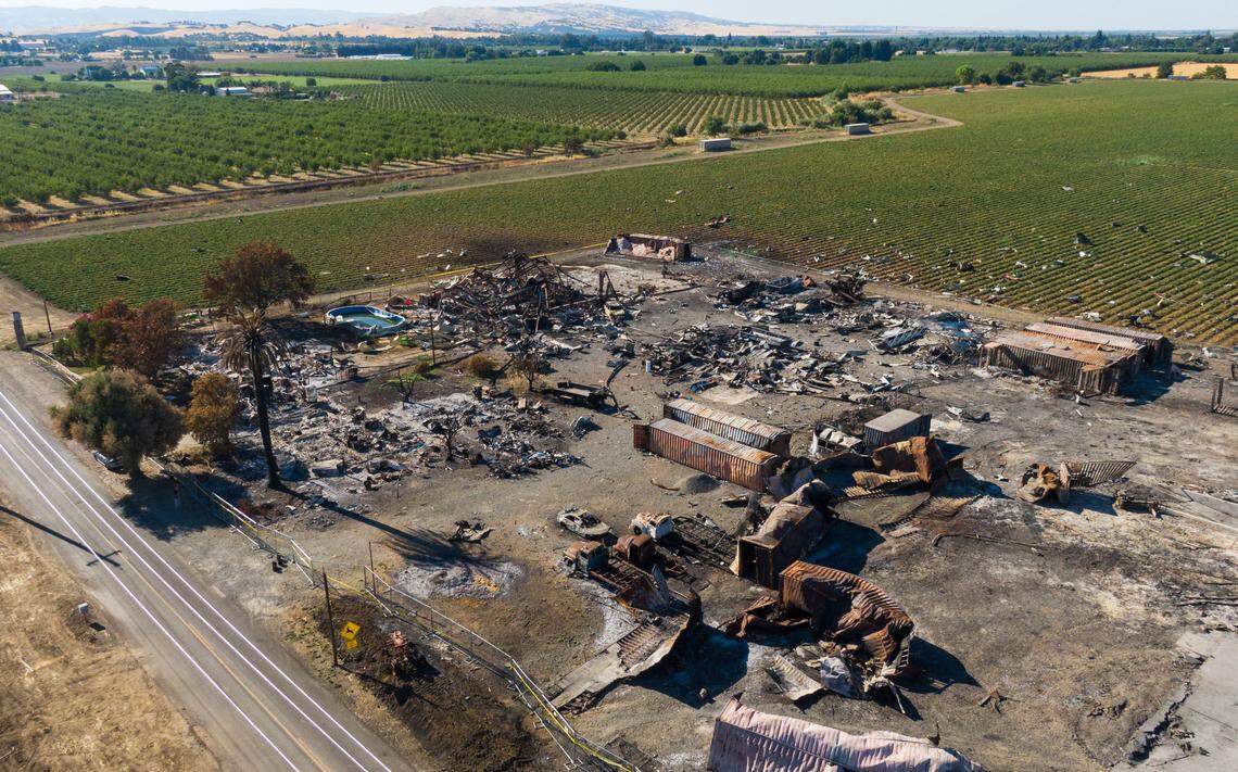 The remains of the Esparto fireworks explosion site stand on County Road 23 on July 18, the first day the evacuation order and area road closures were lifted.