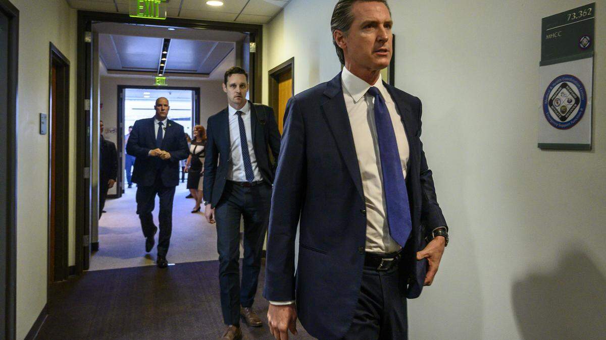 California Governor Gavin Newsom arrives to provide a public briefing on Thursday, Feb. 27, 2020, about the state’s response to novel coronavirus, also known as COVID-19. The Centers for Disease Control and Prevention confirmed Wednesday a possible first case of person-to-person transmission of COVID-19 in California in the general public in Solano County.