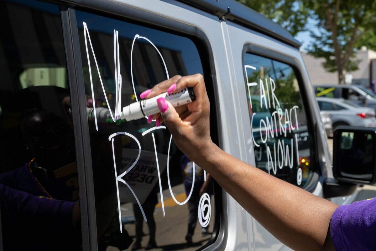 Members of SEIU Local 1000 write "No RTO" on their vehicles during a caravan demonstration in Sacramento protesting return-to-office requirements, on Wednesday, June 10, 2026.