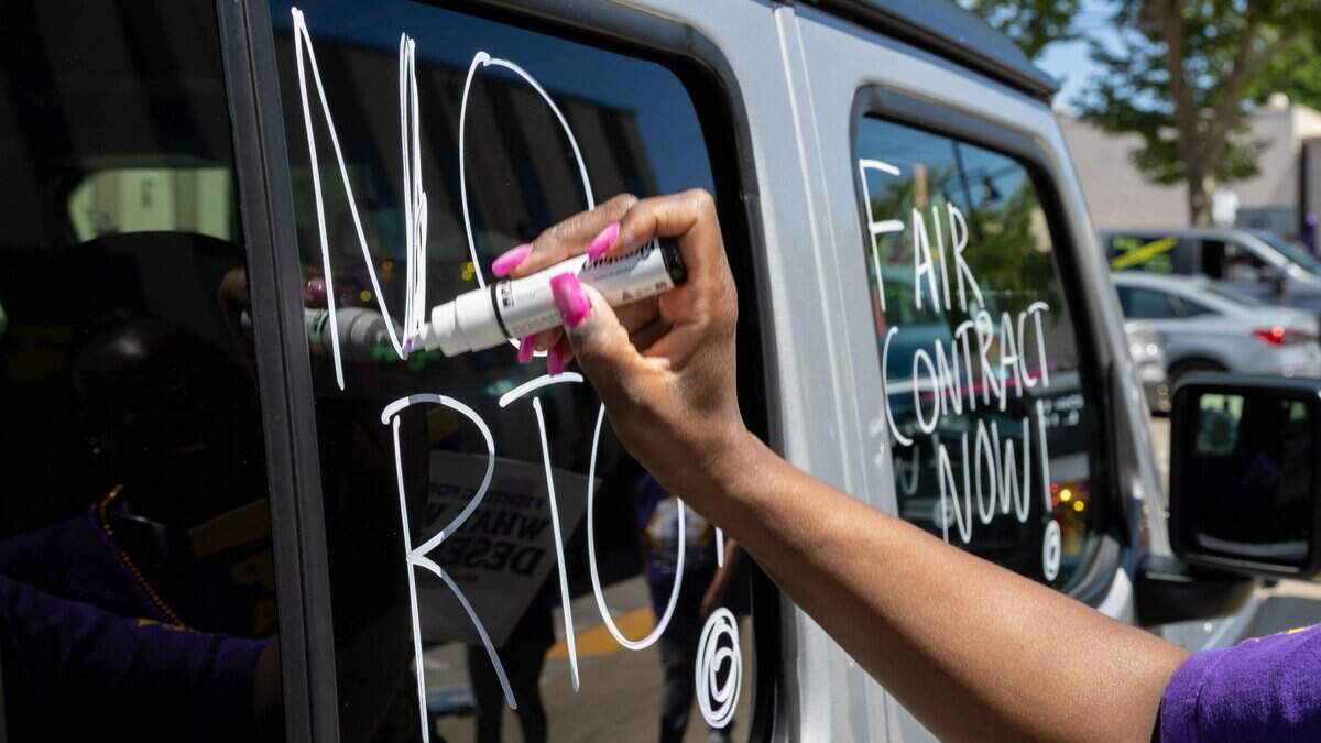 Union members of SEIU Local 1000 write "No RTO" on their vehicles during a caravan demonstration in Sacramento protesting return-to-office requirements on Wednesday, June 10, 2026. SEIU Local 1000 members organized the caravan to oppose state return-to-office policies affecting California government workers.