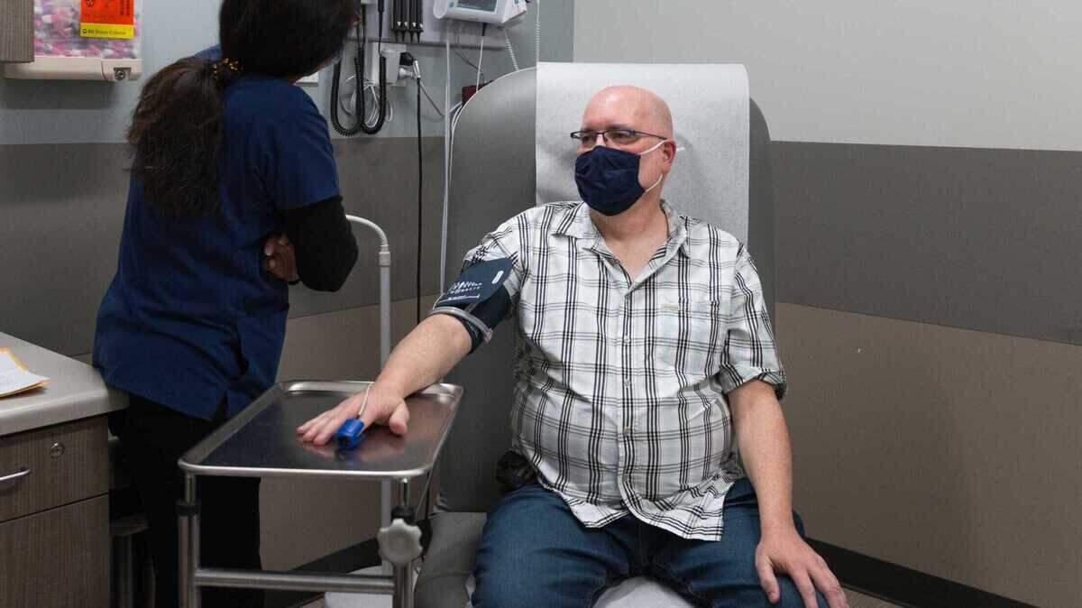 Lloyd Tennison, a Medi-Cal enrollee, gets his blood pressure, blood oxygen level, and pulse rate measured at a medical appointment in Stockton.