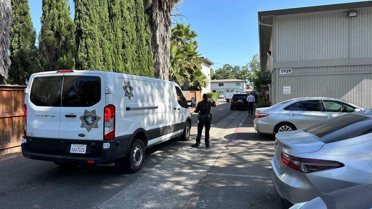 A Coroner’s Office van is led into an apartment complex on the 5900 block of Sutter Avenue, near Fair Oaks Boulevard, in Carmichael following a fatal shooting on Sunday, May 26, 2024. According to authorities, a man was shot and killed after entering an apartment where his ex-girlfriend was sleeping. The woman’s new boyfriend shot the intruder during a fight.