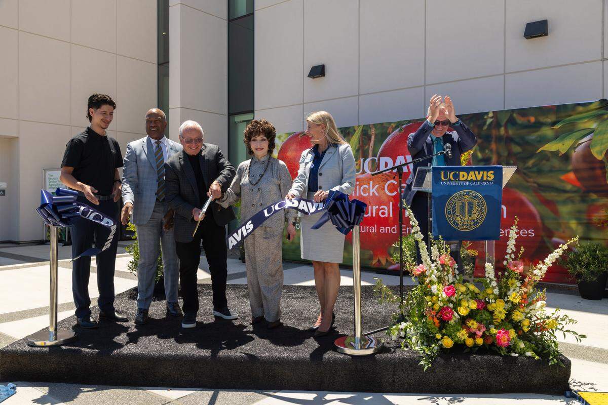 From left: UC Davis student Jose Gomez, Chancellor Gary S. May, philanthropists Stewart and Lynda Resnick, Dean Ashley M. Stokes and Vice Chancellor Shaun Keister celebrate the opening of the Resnick Center for Agricultural Innovation on Tuesday, May 19, 2026. 