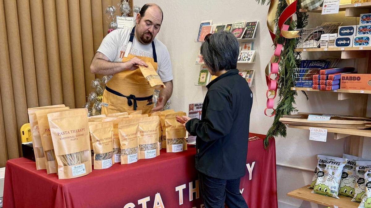 Chef Jason Azevedo of Pasta Therapy sells his pastas and sauces at a pop-up at Land Park's Superette Market on Nov. 23, 2025.
