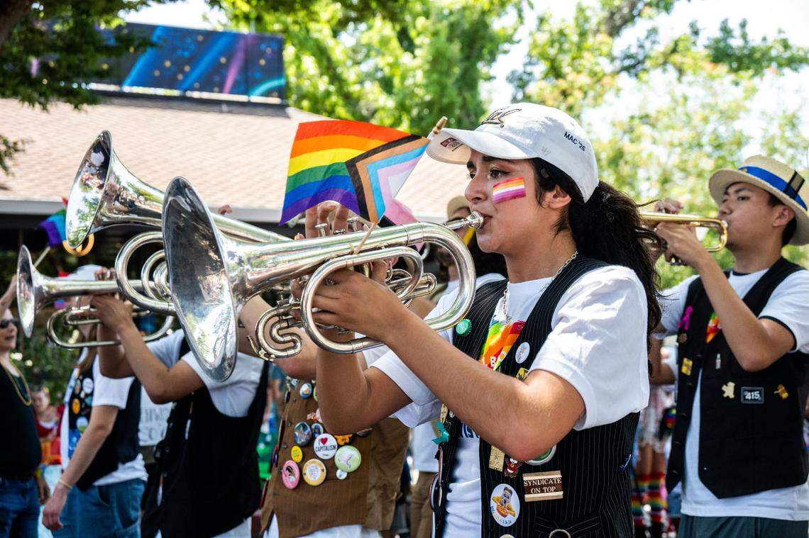 A member of the Cal band from UC Berkeley plays an instrument at the Sacramento Pride March on Sunday.