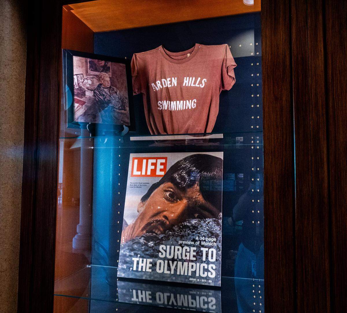 Memorabilia from the former Arden Hills Athletic & Social Club is displayed at Life Time Arden fitness club. Nine-time Olympic champion Mark Spitz, featured on a Life magazine cover from 1972, launched his swim career at the original Arden Hills club.