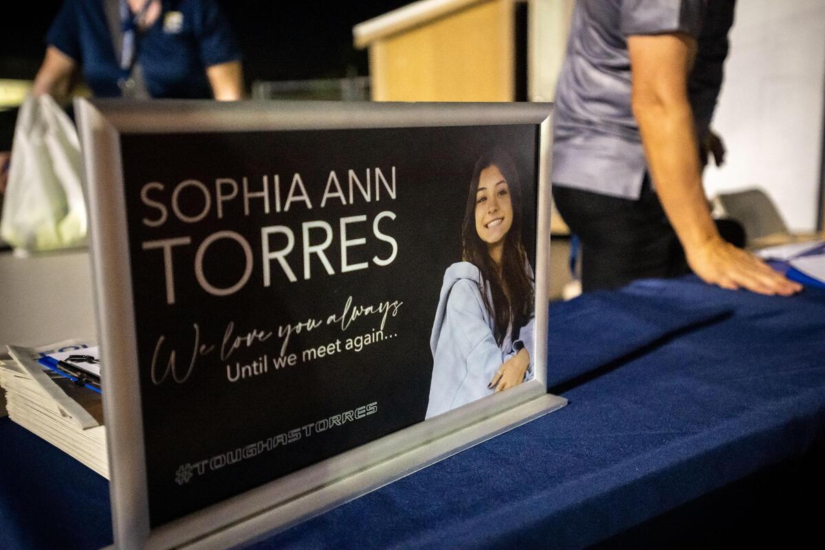 A sign supporting Sophia Torres, an incoming Oak Ridge High School freshman who died earlier this month after being hit by a car in July, sits at the entrance at the high school football game against Vacaville on Friday at Oak Ridge in El Dorado Hills.