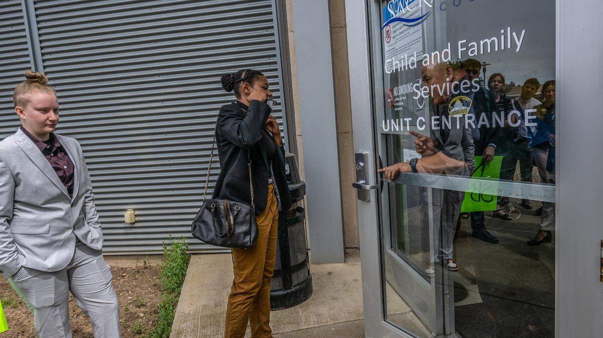 Jasmine Harris, center, and Kristina Tanner, left, with California Youth Connection, are turned away on May 3, 2023, from touring the Warren E. Thornton Youth Center where Sacramento County officials have housed foster youth inside an unlicensed former juvenile detention facility for six months. “We don’t think that youth should be in institutions, we don’t think they should have institutionalized care, they deserved to be seen as individuals,” said Harris. Harris and Tanner are former foster care youth.
