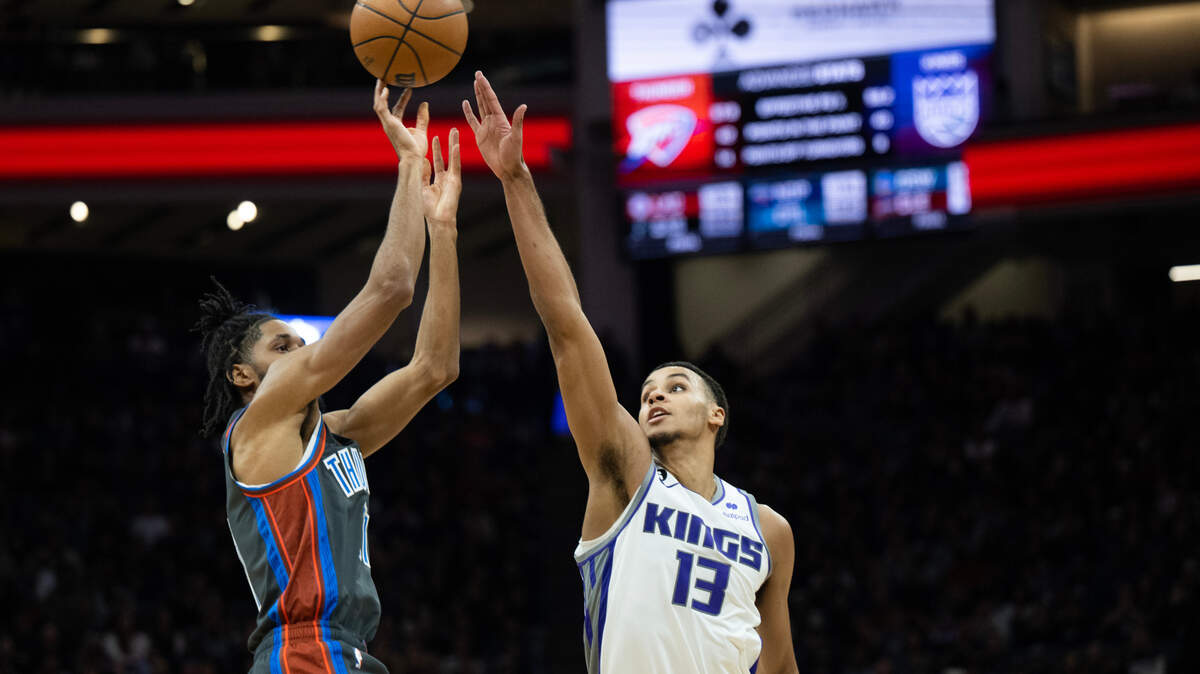 Sacramento Kings forward Keegan Murray (13) defends on shot by Oklahoma City Thunder guard Isaiah Joe (11) in the fourth quarter during a game at Golden 1 Center in Sacramento, Friday, Jan. 20, 2023.