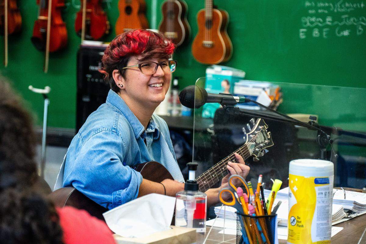 Dakota Medina smiles while leading The Early Birds band through practice at the E. Claire Raley Studios for the Performing Arts in Sacramento on July 29, 2025.