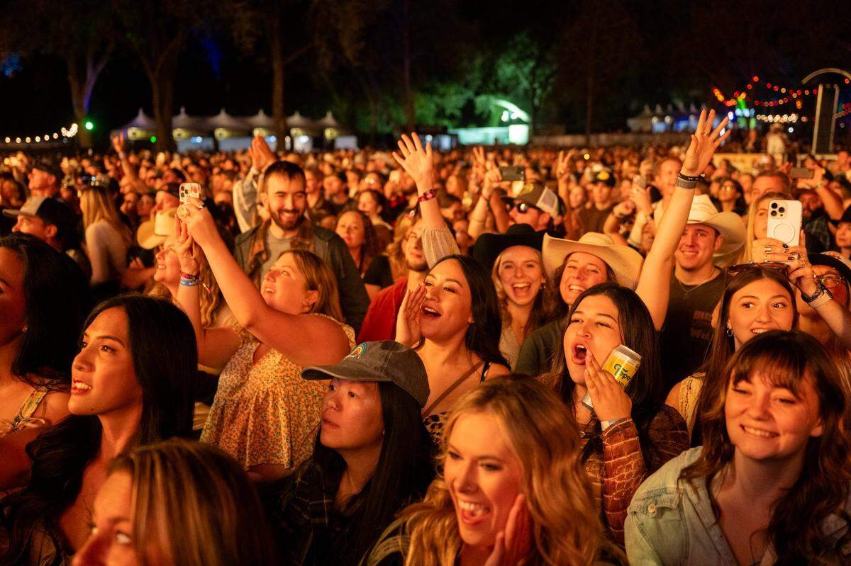 Fans cheer for Elle King during her performance at the GoldenSky Country Music Festival at Discovery Park in Sacramento on Friday, Oct. 18, 2024.