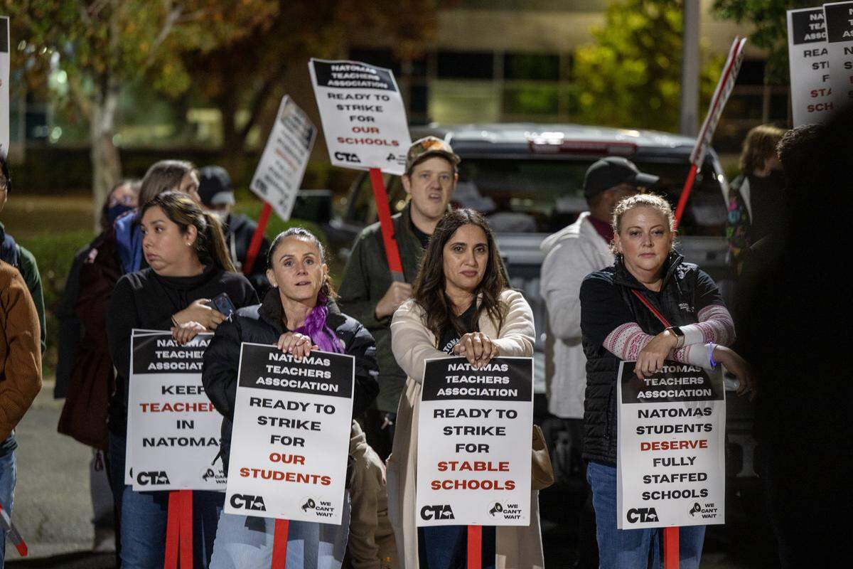 Natomas teachers, joined by parents and students, march and rally outside a Natomas Unified School District board meeting on Wednesday in Sacramento.