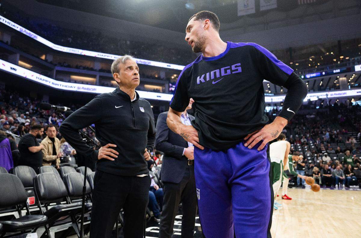 Sacramento Kings owner Vivek Ranadive talks with Sacramento Kings guard Zach LaVine (8) during an NBA game against the Milwaukee Bucks on Saturday, March 22, 2025 at Golden 1 Center.