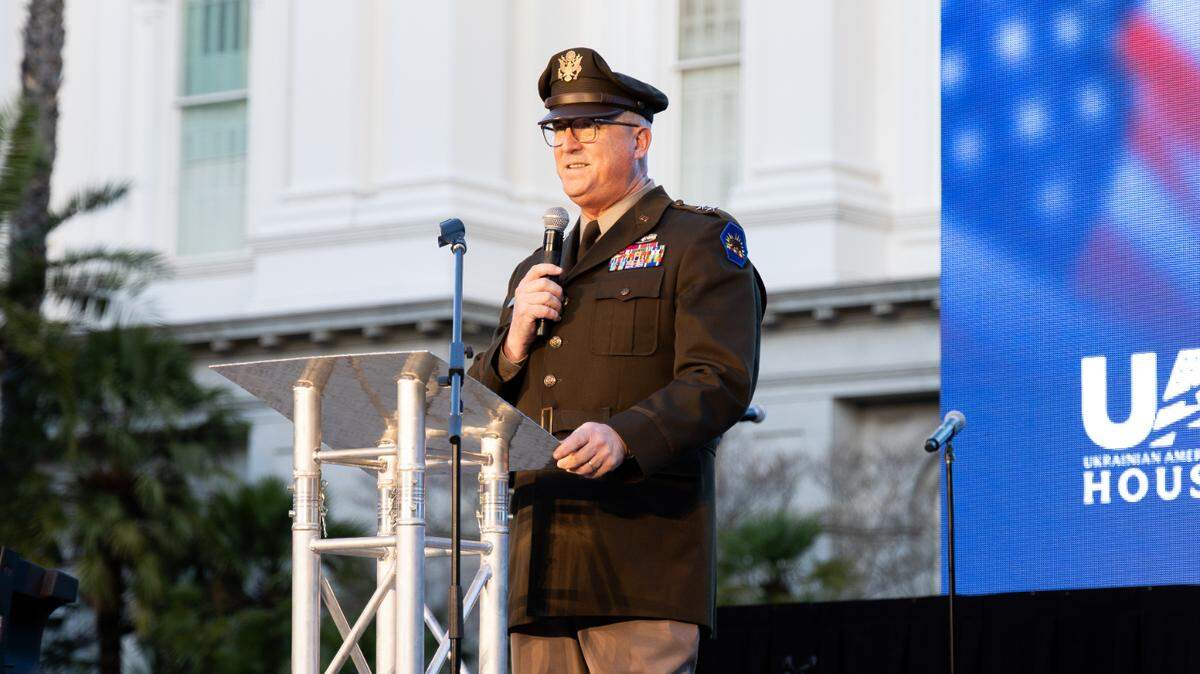 Maj. Gen. Matthew Beevers, who leads California’s National Guard, speaks Saturday at the state Capitol in Sacramento during an event marking the two-year anniversary of Russia’s invasion of Ukraine. Beevers called on Congress to pass military aid for Ukraine. “Free People everywhere know exactly what’s at stake,” Beevers said.