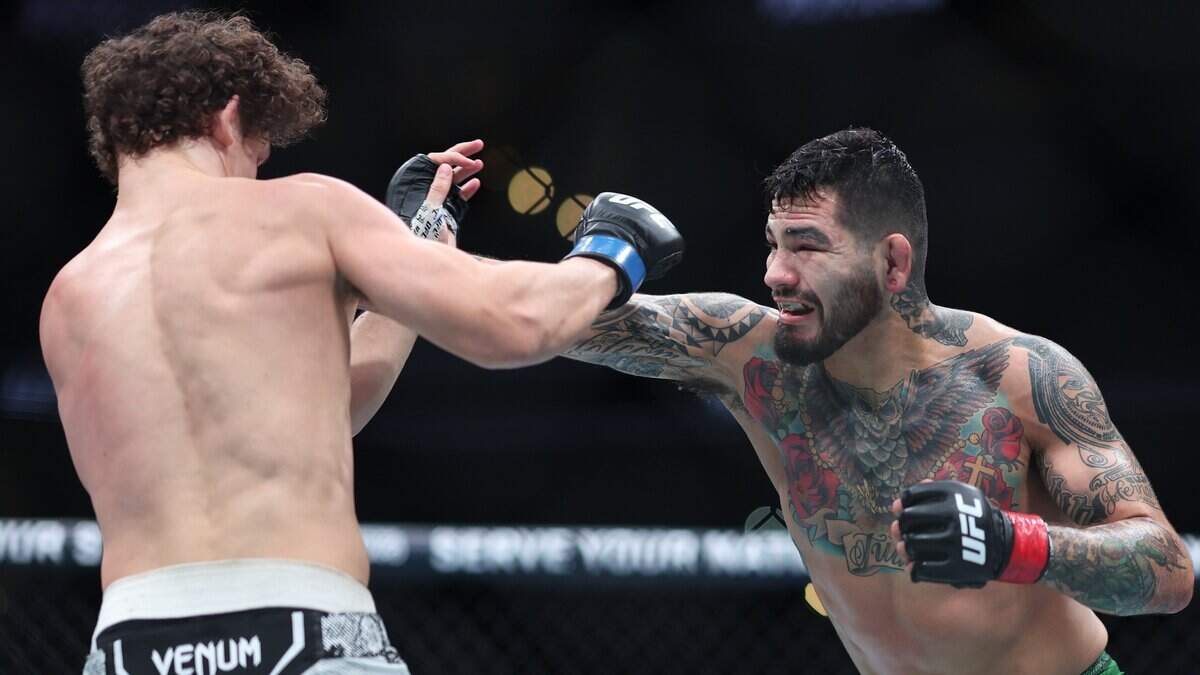 ANAHEIM, CALIFORNIA - FEBRUARY 17: Anthony Hernandez exchanges strikes with Roman Kopylov in their middleweight fight during UFC 298 at Honda Center on February 17, 2024 in Anaheim, California. (Photo by Sean M. Haffey/Getty Images)